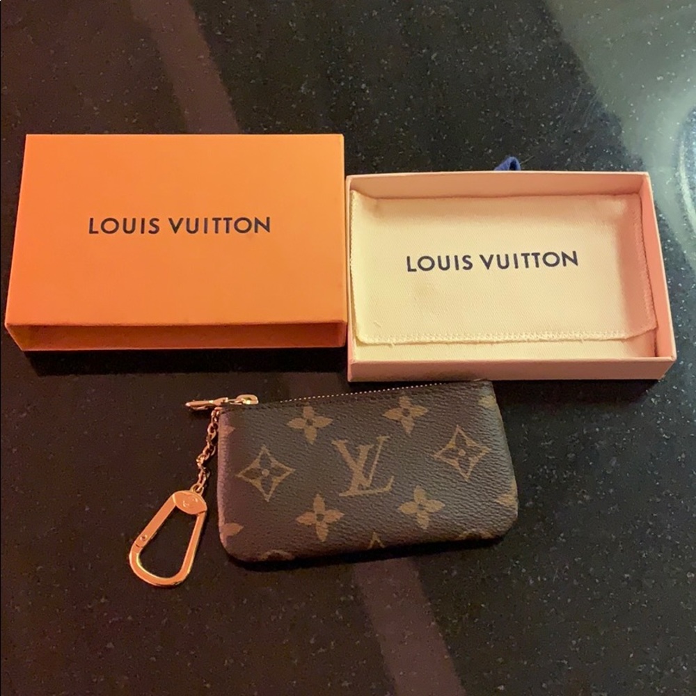 Louis Vuitton card holder. NEVER USED!